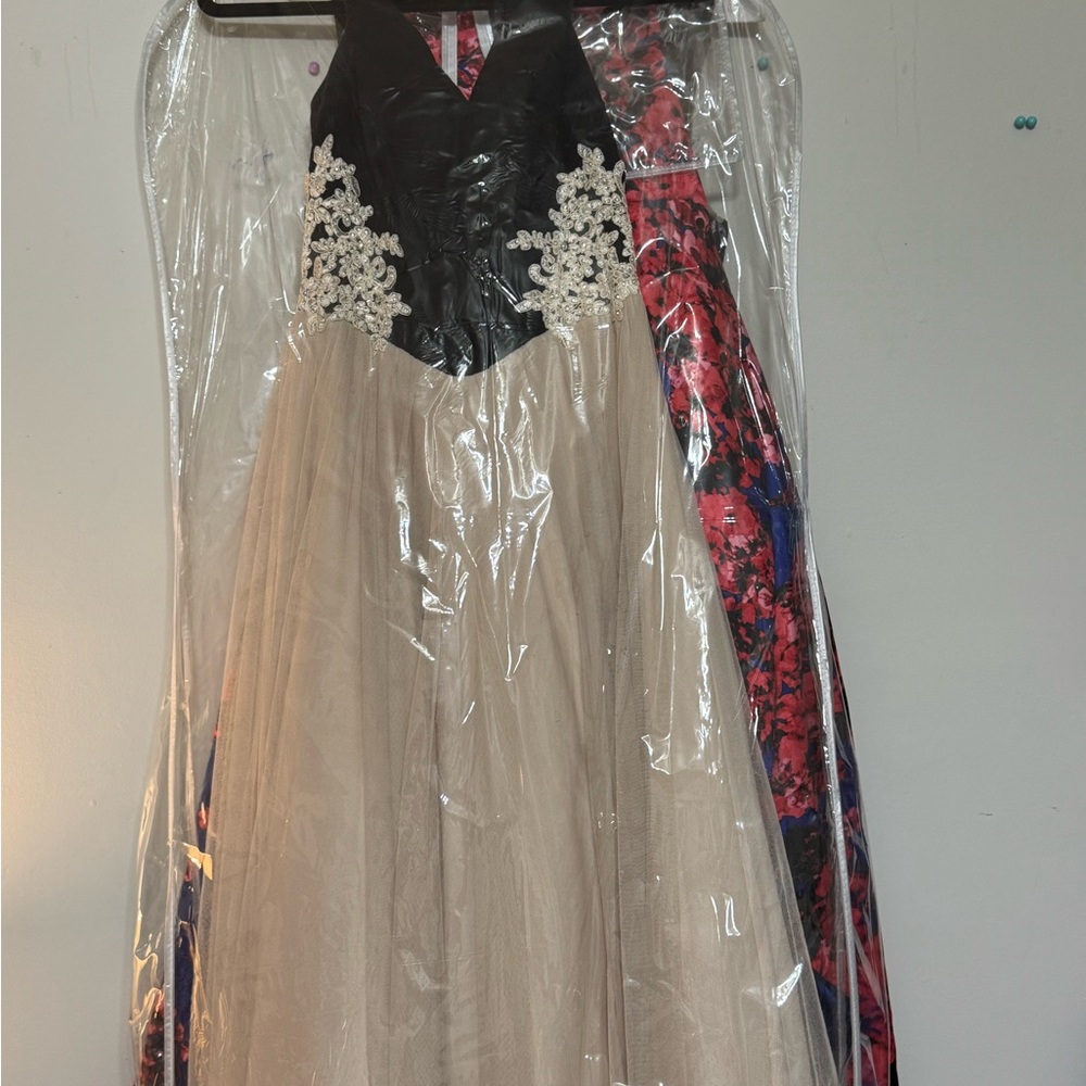 Elegant Black and Cream Gown with Floral Accents
